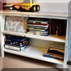 F44. White painted bookcase.  